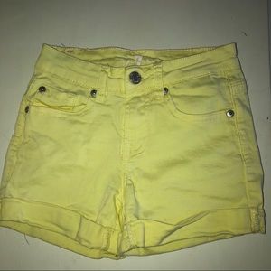 yellow shorts size 8 pockets in front and back